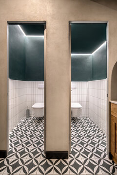 Modern family restaurant with stylish illuminated restroom