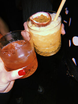 UGC shot of cocktails in bar at night