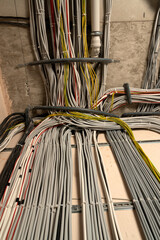 Large group of UTP cables, Ethernet cables in rack cabinet, UTP cables from a patch panel in the...