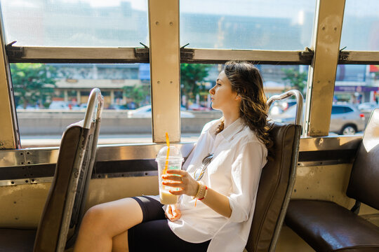 Woman traveling in bus in Bangkok 