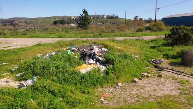 2023 - Excellent aerial footage of a heap of litter in a field in Lompoc, California.