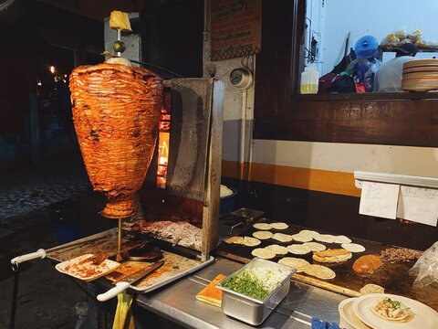 Spit of al pastor taco meat