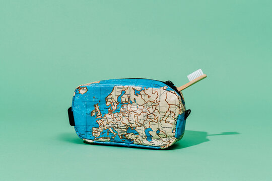  map-patterned toilet bag and bamboo toothbrush