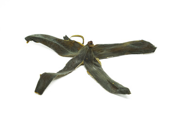 dried banana peels on a white background