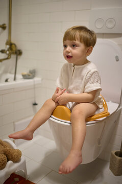 boy spending time on a toilet
