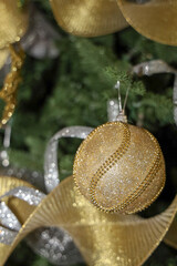 Christmas background with copy space. Christmas tree decoration with gold and silver.