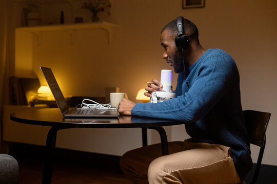 Podcaster records at home