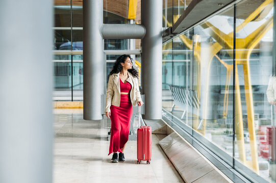 Woman with suitcase in airport