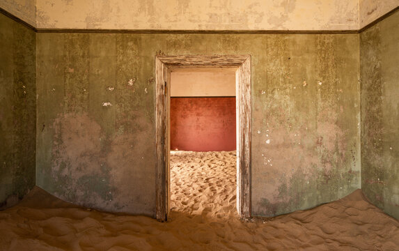House buried by the desert in Kolmanskop ghost town, Namibia, Africa.