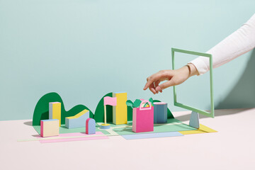 A woman picks up a bag of food at the door of her house
