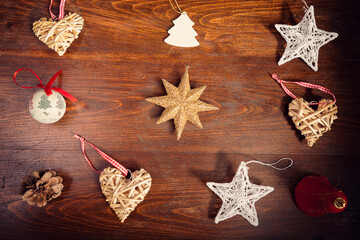 Decor for Christmas on wooden background in vintage toning