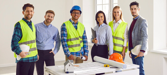 Portrait of team of diversity multiethnic architects, engineers, interior designers and workers...