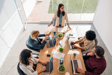 Businesspeople Working in Bright Workspace Office