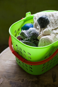 balls of yarn for knitting in the basket