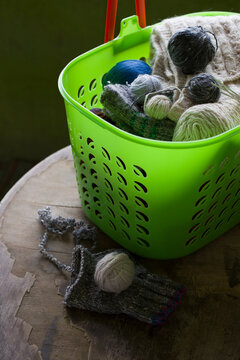 balls of yarn for knitting in the basket