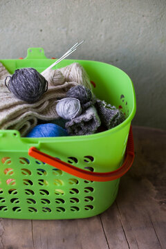 balls of yarn for knitting in the basket