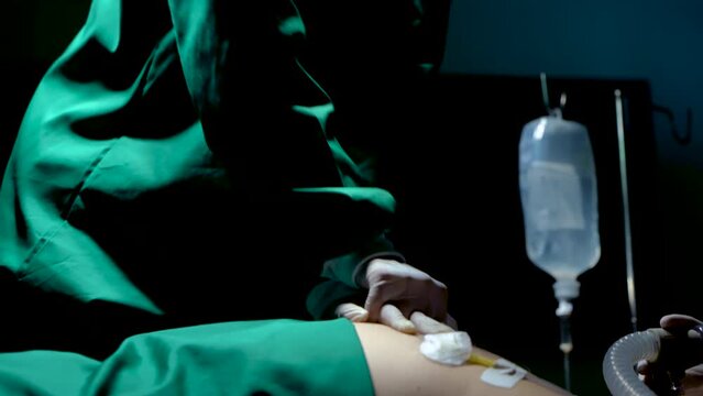 4K, close up Doctor's, pumping heart sick person, save life while pulse stopped, when he had completed operation, doctors urgently rushed to save lives, patient was lying still, unresponsive.