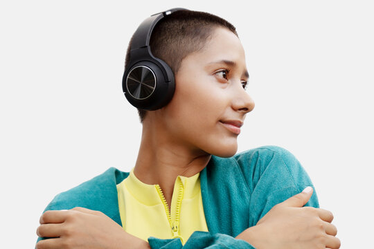 Smiling Woman Wearing Wireless Headphones