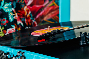 record in a retro blue turntable