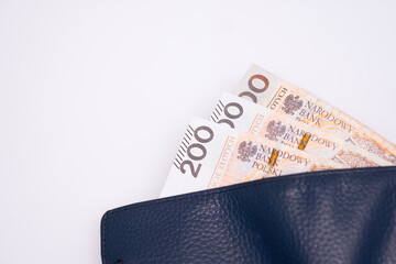 close-up of 200 zloty banknotes in a wallet