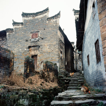 The alley is flanked by ancient buildings