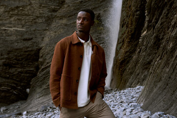 Fashion editorial at a waterfall