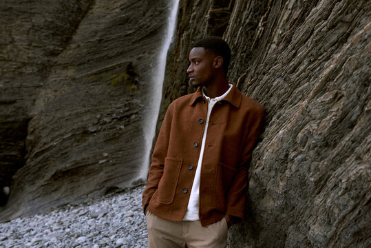 Fashion editorial at a waterfall