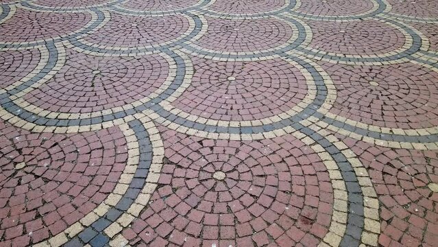 Walk pov on cobblestone pavement pattern