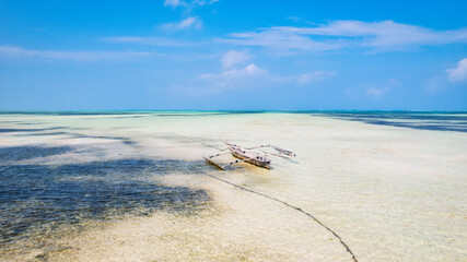 The refreshing sea breeze during Zanzibar beach summers is a welcome respite from the heat.