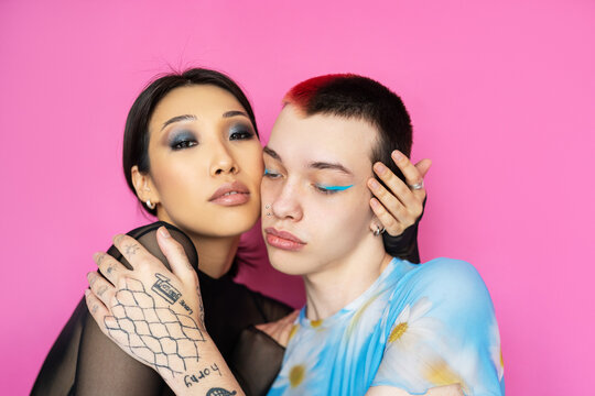 Diverse Friends Touching Each Others Faces