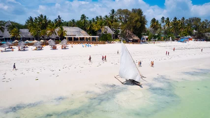 Photo sur Plexiglas Plage de Nungwi, Tanzanie The white sandy beaches of Zanzibar are the ideal spot for spending lazy Zanzibar beach summers.