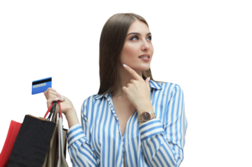 Shopper girl holding credit card and shopping bags looking up.