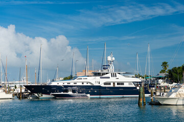 Fototapeta premium yacht at seaside harbour for traveling vacation. photo of yacht at seaside harbour.