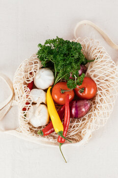 Vegetables in a mesh tote bag