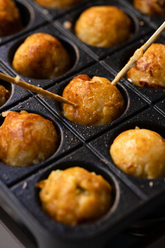 Takoyaki. Delicious octopus japanese croquettes