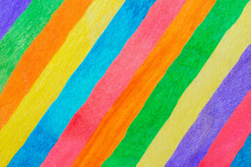 Multicolored stripes arranged diagonally. Rainbow colors. Colorful striped background texture