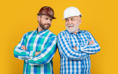 cheerful workman generation men in studio. workman generation men on background