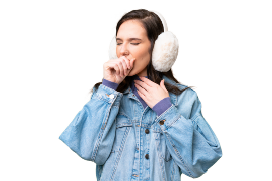 Young caucasian woman wearing winter muffs over isolated background is suffering with cough and feeling bad