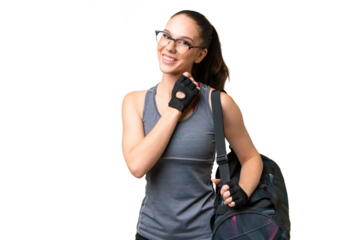 Young sport woman with sport bag over isolated background with glasses and smiling