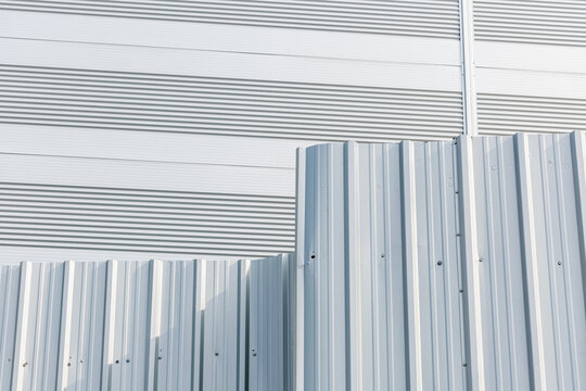 Steel warehouse walls and steel fences.