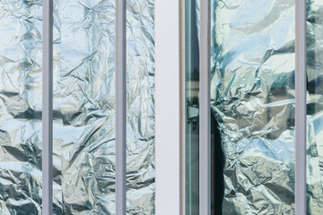 Windows covered with vinyl.