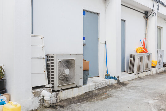 Ventilators and cleaning tools at the back of the building.