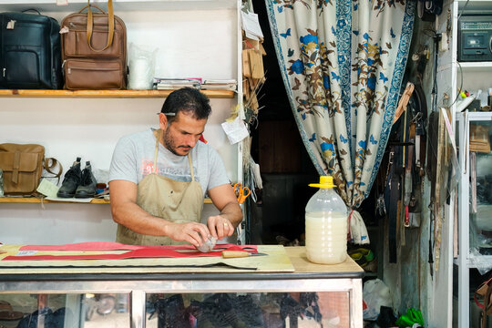 Latino worker in his workshop