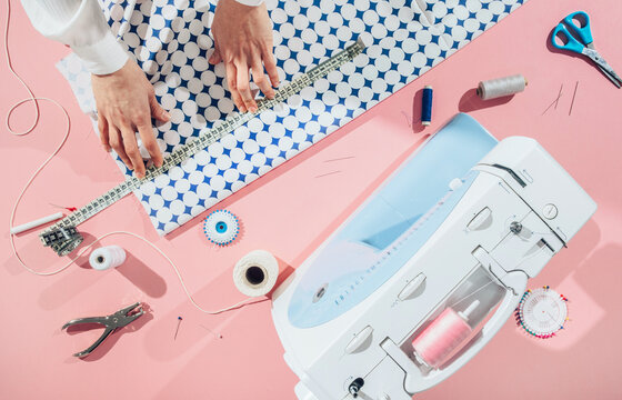 Female entrepreneur working tailor atelier.