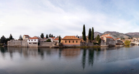 Naklejka na ściany i meble Trebinje old town front view from the other side of the river Trebisnjica