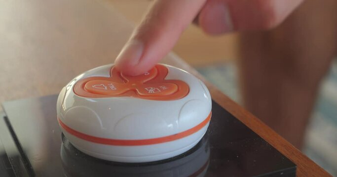 close-up fingers of unrecognizable man cancel call waiter men's hands press the button to cancel call of the waiter the man made a mistake and pressed cancel call the waiter