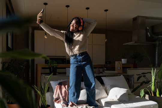 Woman dancing and recording videos for tik tok