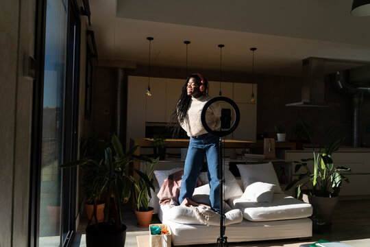 Woman dancing and recording videos for tik tok