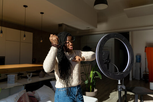 Woman dancing and recording videos for tik tok