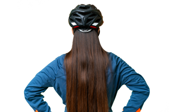 Young cyclist woman over isolated chroma key background in back position